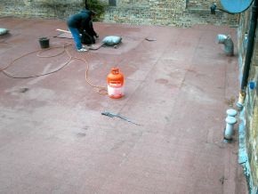 Replacement flat garage roof